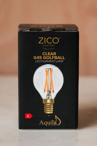 Image of the Golf Ball E14 4W Clear LED Light Bulb in a box.