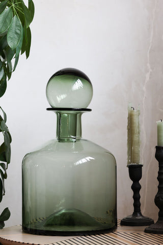 Lifestyle image of the Green Glass Apothecary Bottle