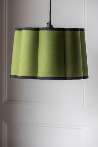 Lifestyle image of the Olive Green Scalloped Lampshade