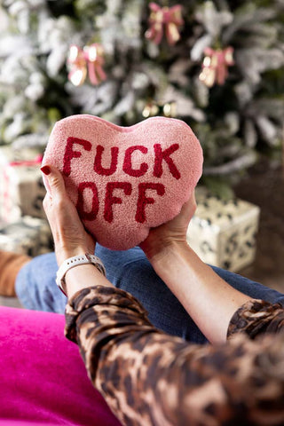 Lifestyle image of the Heart Shape 'Fuck Off' Microwaveable Wheat Bag