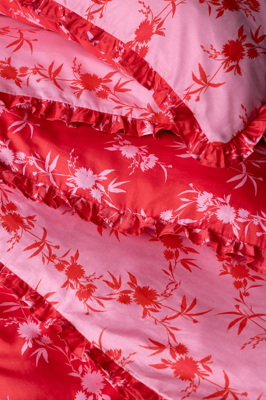 Close-up of the Hot Pink Floral Frill Duvet Cover and Pillow Case Set.