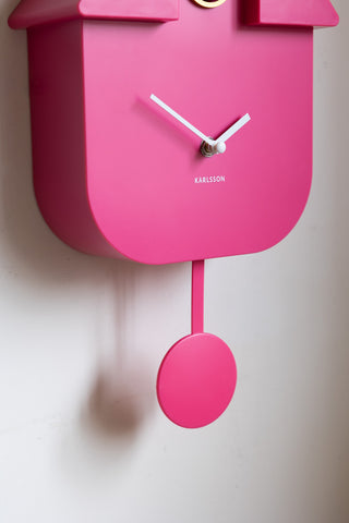Close-up of the Hot Pink Modern Cuckoo Wall Clock.