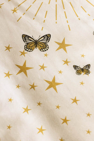 A close up of the stars and butterfly detailing on the Jane's Rose Duvet Cover and Pillow Set.