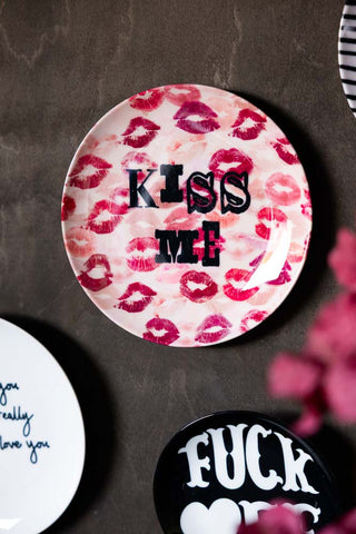 Lifestyle image of the Kiss Me Decorative Wall Plate