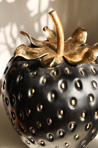 Close-up image of the Large Black & Gold Strawberry Ornament