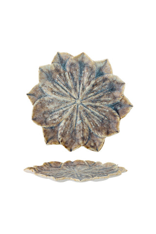 Cutout image of large lotus flower trinket dish on a white background. 