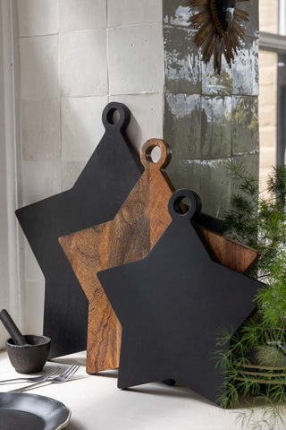 Image of the Large Black Star Serving Board in a kitchen setting