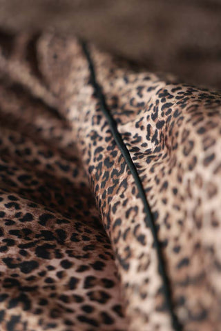 Detail of the seam on the Leopard Love Duvet Cover and Pillow Case Set.