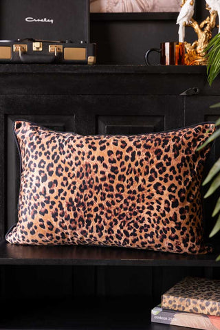Lifestyle image of the Leopard Love Print Cushion