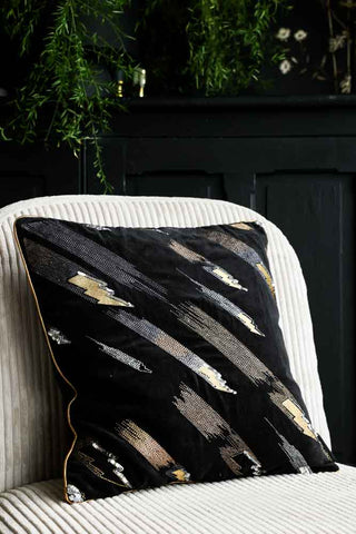 Lifestyle image of the Black Love Struck Cushion