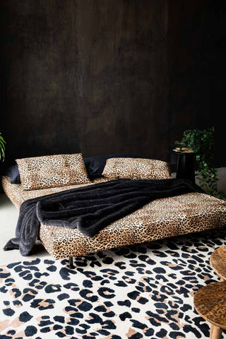 Image of the Mabel Large 2 Seater Sofa Bed in Leopard Love Velvet as a bed