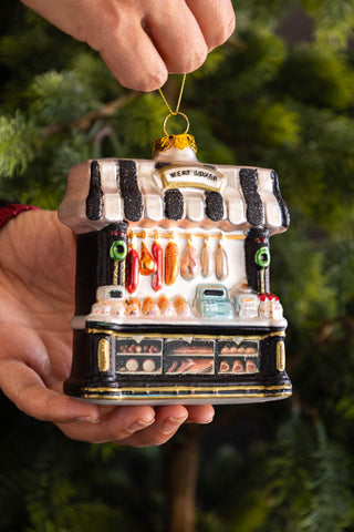 Lifestyle image of the Meat Trader Glass Christmas Tree Decoration