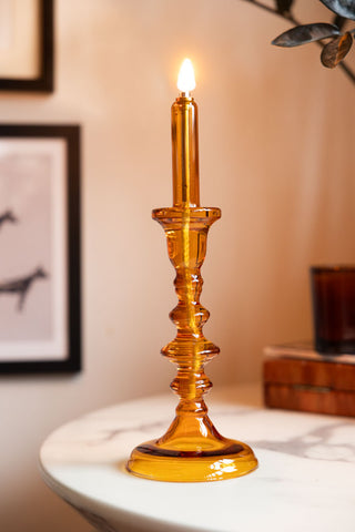 Lifestyle image of the Medium Amber Glass Refillable Candle Holder