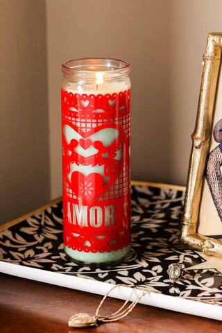 Lifestyle image of the Mexican Folk Art Candle in Red