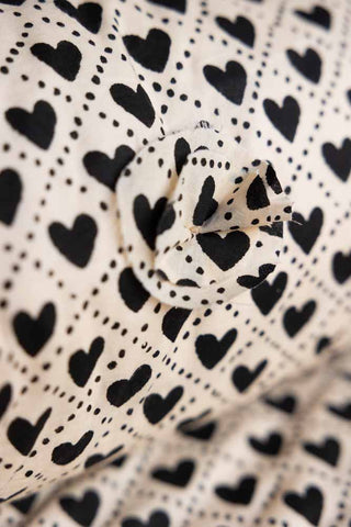 Image of the material for the Monochrome Heart End Of Bed Throw