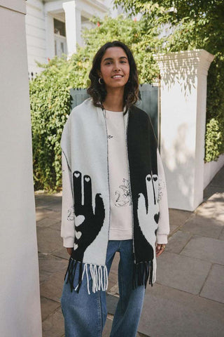 Lifestyle image of the Monochrome Printed Hands Scarf