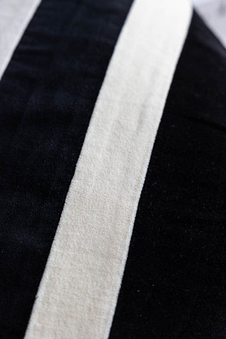 Close-up image of the Monochrome Stripe Velvet Cushion