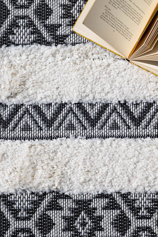 Close-up image of the Monochrome Aztec Stripe Indoor/Outdoor Garden Rug - 3 Sizes Available