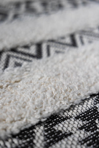 Detail image of the Monochrome Aztec Stripe Indoor/Outdoor Garden Rug - 3 Sizes Available