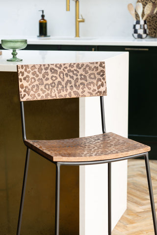 Natural Leopard Love Bar Stool kitchen island in kitchen setting cropped in