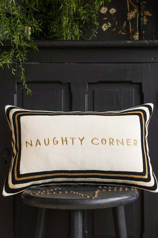 Lifestyle image of the Naughty Corner Cushion