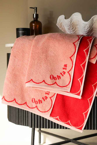 Lifestyle image of the Ooh La La Bath Towel underneath the Ooh La La Hand Towel