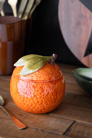 Lifestyle image of the Orange Storage Jar