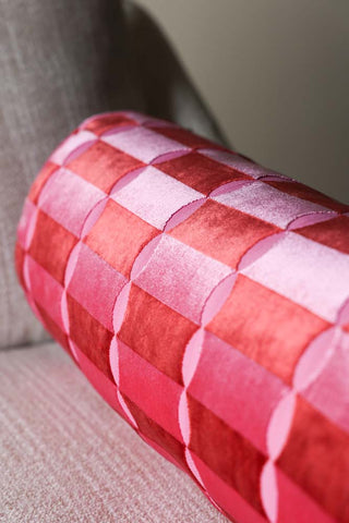 Close-up image of the Pink Deco Cut Velvet Bolster.