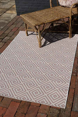 Lifestyle image of the Pink Diamond Indoor/Outdoor Garden Rug - 3 Sizes Available