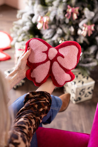 Lifestyle image of the Pink & Red Bow Shape Microwaveable Wheat Bag
