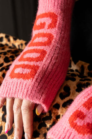 Close-up of the Pink & Red Good Times Handwarmers being worn by a model.