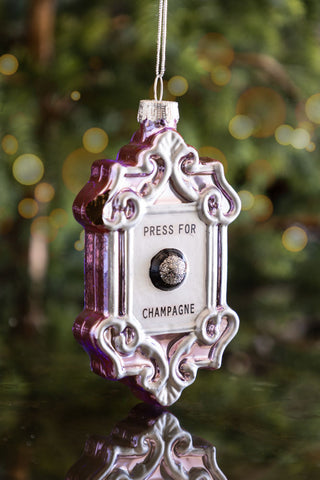 Lifestyle image of the Press For Champagne Glass Christmas Tree Decoration