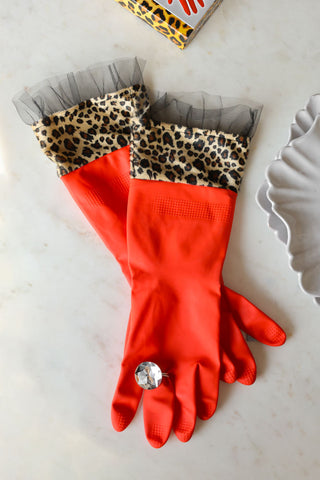 Lifestyle image of the Red Leopard Print Washing-up Gloves