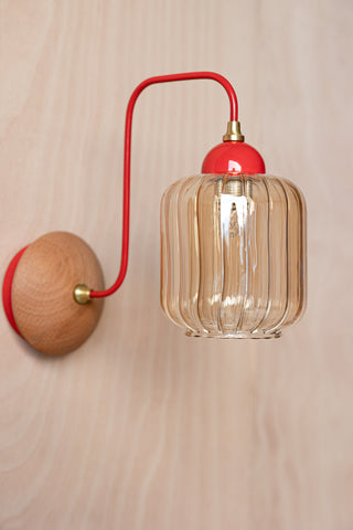 Detail image of the Red Metal & Ribbed Glass Wall Light