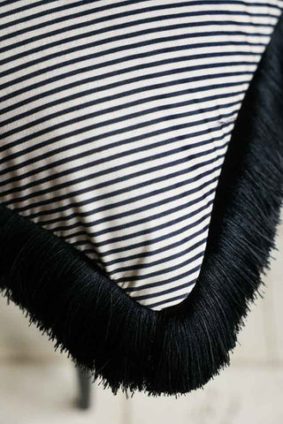 Close-up image of the Sand Stripe Velvet Fringe Feather Filled Cushion
