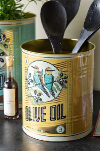 One of the Set Of 2 Olive Oil Storage Tins - Large displayed with utensils inside.