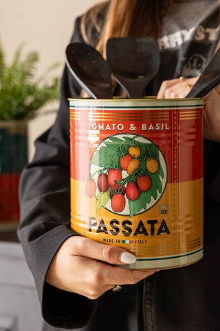 One of the Set Of 2 Passata Storage Tins with utensils inside.