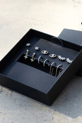 The Set Of 6 Gold & Crystal Stud Earrings displayed in their box.