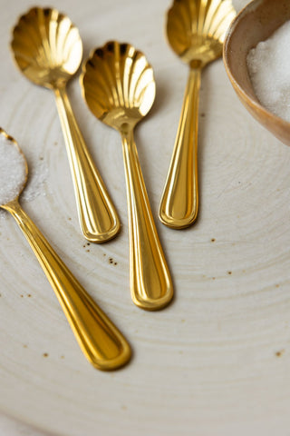 Close-up of the Set of 4 Gold Shell Teaspoons.