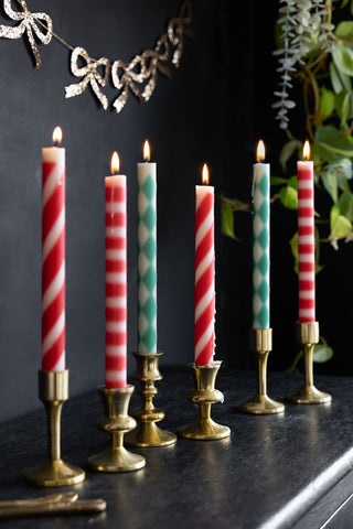 Lifestyle image of the Set of 6 Festive Patterned Dinner Candles