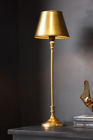 Lifestyle image of the Slim Antique Brass Table Lamp With Metal Shade