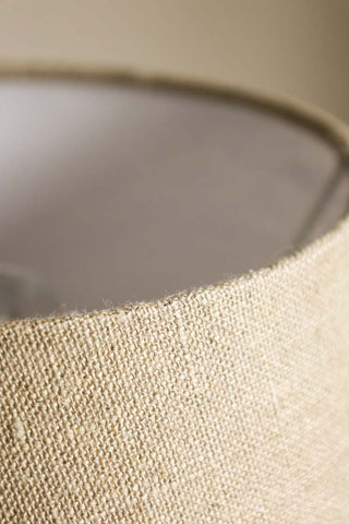 Detail image of the Slim Table Lamp with Red Scalloped Linen Shade. 