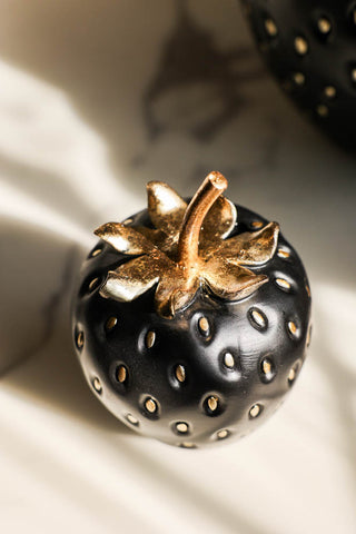 Close-up image of the Small Black & Gold Strawberry Ornament