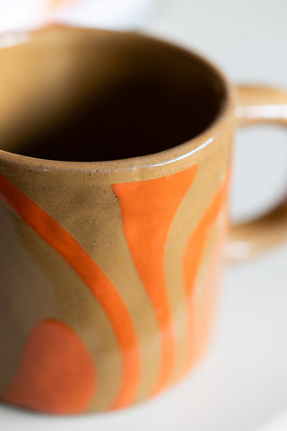Detail image of the Small Orange Abstract Marble Mug
