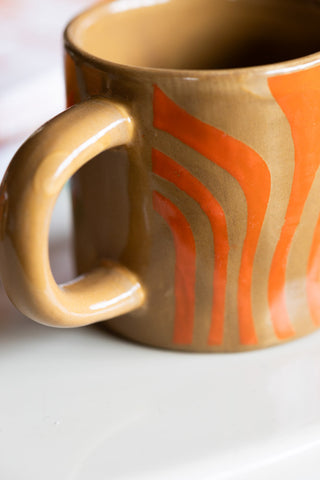 Image of the finish for the Small Orange Abstract Marble Mug
