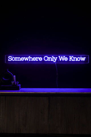 Lifestyle image of the Somewhere Only We Know Neon Wall Light