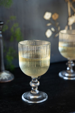 Lifestyle image of the Ribbed Wine Glass