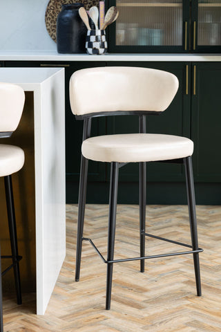 The Blake Bar Stool In Champagne Neutral at a kitchen island.