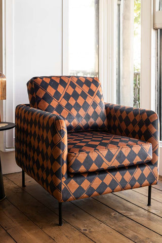 Lifestyle image of the The Edie Caramel Checkerboard Velvet Armchair