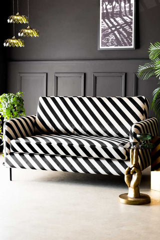 Lifestyle image of the The Edie 2 Seater Sofa in Studio Stripe Velvet